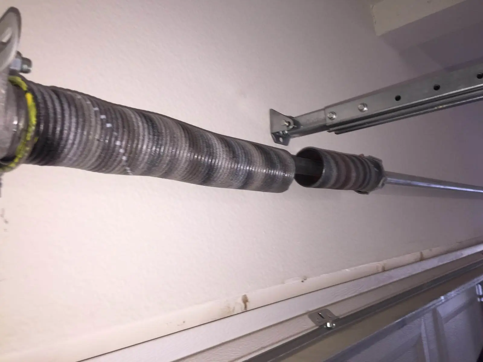 garage door spring repair Hampton